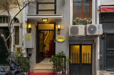 a building with a door and a sign on it at BeyPort Hotel Istanbul in Istanbul