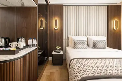 a hotel room with a bed and a counter at Dream Inn Karaköy Bosphorus in Istanbul