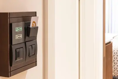 a wall mounted appliance with a dispenser on a wall at Dream Inn Karaköy Bosphorus in Istanbul