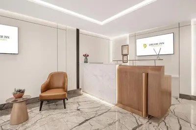 a lobby with a reception desk and a chair at Dream Inn Karaköy Bosphorus in Istanbul