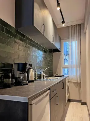 a kitchen with a sink and a counter top at Central & cosy flat for 4 Person in Istanbul