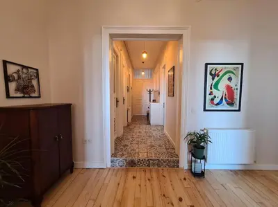 an empty hallway with a hallway leading to a room with a hallway at Elegant, spacious, quiet 3br near historic center in Istanbul