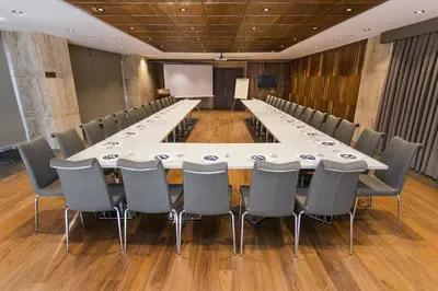 a large conference room with a long table and chairs at Fesa Business Hotel in Gebze