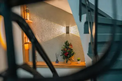 a flower arrangement on a shelf in a room at Taksim Santa Lucia Hotel in Istanbul