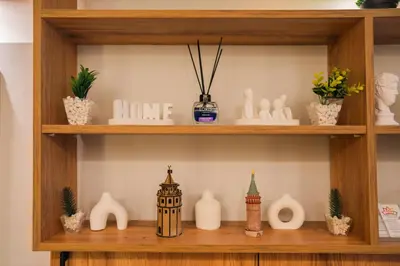 a shelf with vases and other items on it at Taksim Santa Lucia Hotel in Istanbul