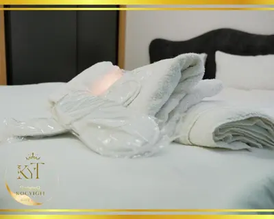 a pile of towels on top of a bed at Koçyiğit Suite & Hotel in Istanbul