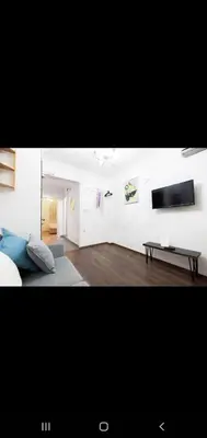 a living room with a bed and a table at 3 FLOOR OLD CITY 1 in Istanbul