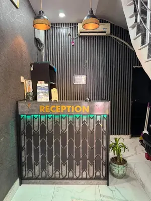 a reception desk with a sign on it in a room at beyzade apart hotel in Istanbul