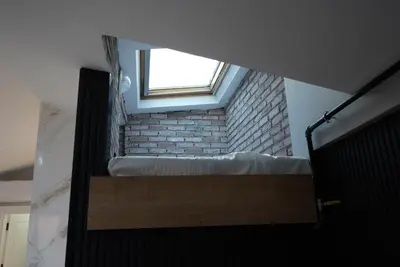 a bedroom with a window and a bed in a room at Adgsuites in Istanbul