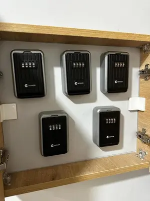 a wall with four black burners on a wall at Adgsuites in Istanbul