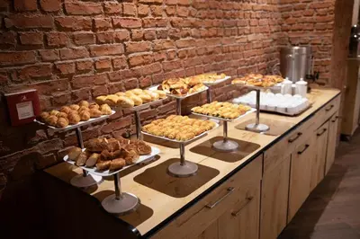 a buffet with many different types of pastries on display at Grand Aras Hotel & Suites in Istanbul