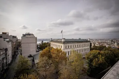 a building with an american flag on top of it at ISTANBUL SUITE in Istanbul
