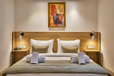 a bedroom with a large bed with two pillows at Joyway Hotels Istanbul Sultanahmet in Istanbul