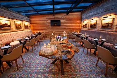 a restaurant with tables and chairs in a room at Hotel Miniature Istanbul in Istanbul