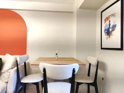 a small dining room with a table and chairs at Flex Ortakoy in Istanbul