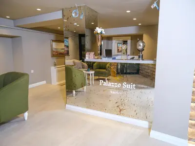 a lobby with a pajola suite sign on the wall at La Vida Ex Palazzo Suit Karaköy in Istanbul