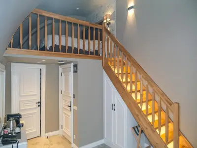 a staircase in a house with a bedroom at La Vida Ex Palazzo Suit Karaköy in Istanbul