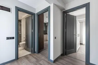 a hallway with four sliding doors in a house at Duplex Penthouse wparking 3BD2Bath Views! #340 in Istanbul