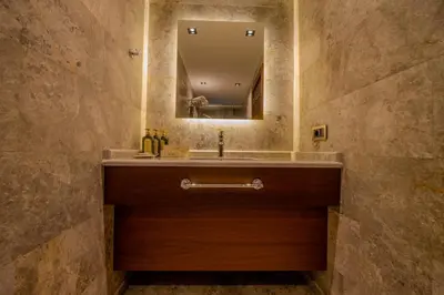a bathroom with a sink and a mirror at B'İSTANBUL HOTEL in Istanbul