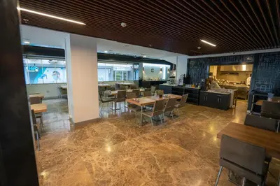 a dining room with tables and chairs in a restaurant at Business Life Hotel & Spa Şişli in Istanbul