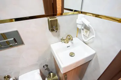 a bathroom with a sink and a toilet at Sayina Hotel in Istanbul