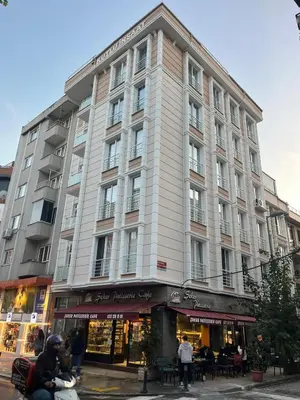 a large building on the corner of a street at G&B MANSION in Istanbul