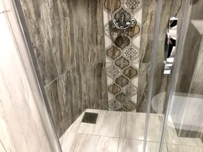 a shower with a glass door in a bathroom at Istanberry - Dream Apartments in Istanbul