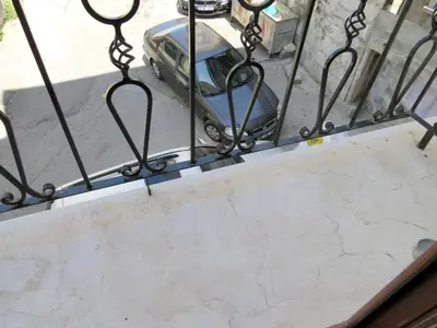 a car parked next to a ramp with a fence at Istanberry - Paradise Two Bedroom Apartments in Istanbul