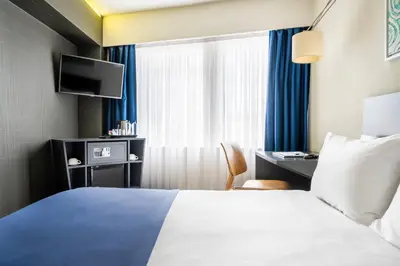 a hotel room with a bed and a window at Misa Hotel in Istanbul