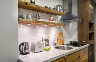 a kitchen counter with a sink and a toaster at Pera Neuf in Istanbul