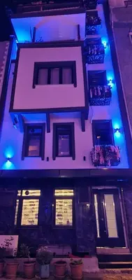 a building with blue lights on top of it at BOLCELLO HOTEl in Istanbul