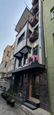 a building with flower boxes on the side of it at BOLCELLO HOTEl in Istanbul