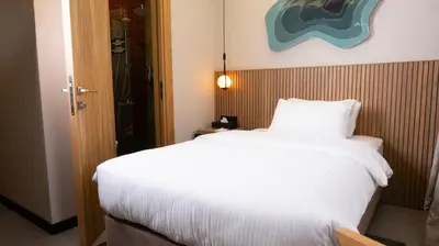 a bedroom with a large white bed in it at BeL LETTO HOTEL in Istanbul