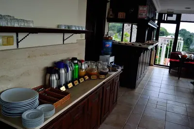 a kitchen with a counter with dishes on it at Hotel Alp Guesthouse in Istanbul