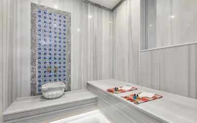a white room with two tables and a window at Hattusa Vacation Business Thermal Hotel Saray in Saray