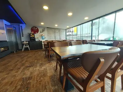 a restaurant with a wooden table and chairs at Leyenda Boutıque Hotel in Istanbul