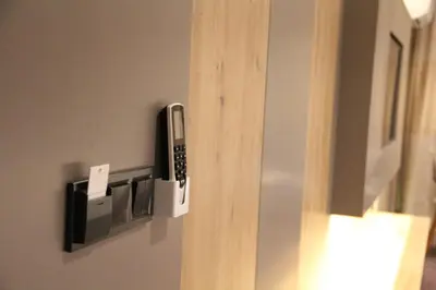 a room with a phone hanging on a wall at Sabiha Sultan Hotel-Karakoy in Istanbul
