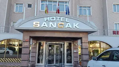 a hotel saar cafe sign in front of a building at SANCAK HOTEL in Buyukcekmece