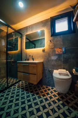 a bathroom with a toilet and a sink and a shower at Vital Göl Sapanca Özel Havuzlu Bungalov & Villa in Sapanca