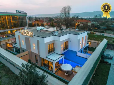 an aerial view of a house with a swimming pool at Luxon Sapanca Family Villas in Sakarya