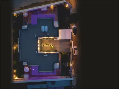 an overhead view of a house at night with lights at Luxon Sapanca Family Villas in Sakarya