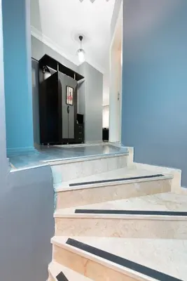 a hallway with a staircase in a building at Leyla palas in Istanbul