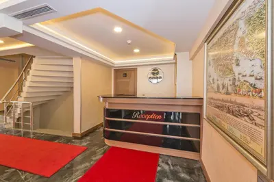 a wine cellar with a red carpet and stairs at Floransa City Hotel in Istanbul