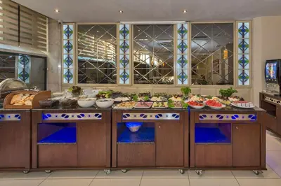 a kitchen with a buffet with a lot of food at Green Anka Hotel in Istanbul