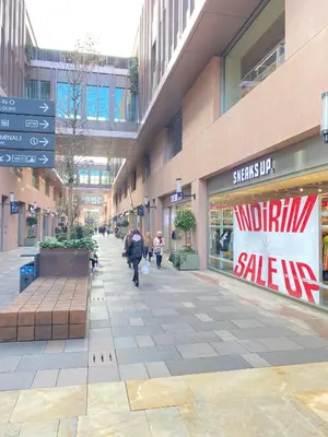 a shopping mall with a walmart sale sign in front of it at Historical comfy flat in Beyoğlu tophane, galata in Istanbul