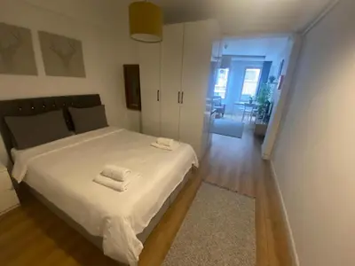 a bedroom with a bed with two towels on it at BEYOĞLU in Istanbul