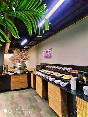 a buffet line with a bunch of food on at N&D&D Hotel in Nilüfer