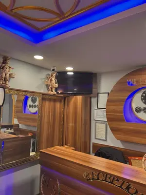 a bar in a restaurant with a mirror at otel grand sami in Istanbul