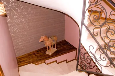 a statue of a horse standing on a stair case at Kerimbey Hotel in Gemlik