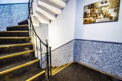 a staircase in a building with blue tiles at Deluxe Double Room 4 in Istanbul